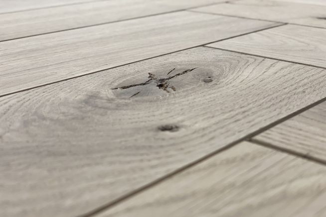 herringbone-parquet-engineered-oak-flooring-character-boards-close-up-knot