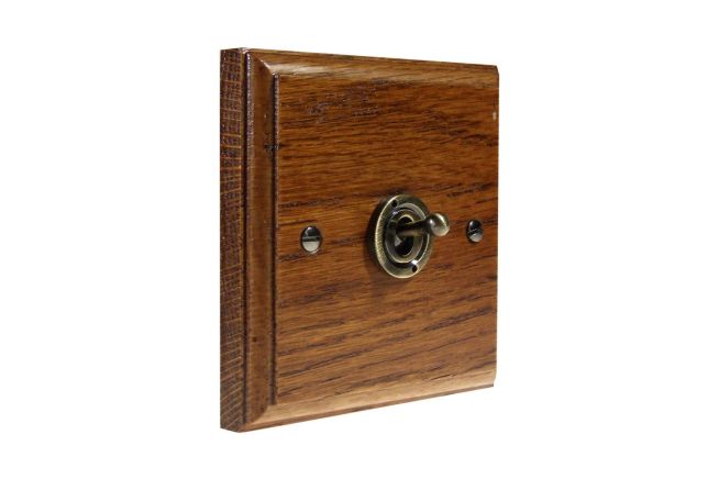 toggle-switch-1gang-2way-antique-brass-medium-oak